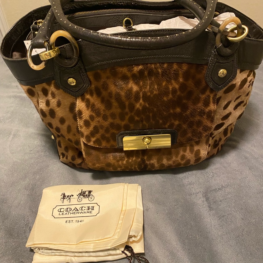 Brown multi color calf hair Coach bag.